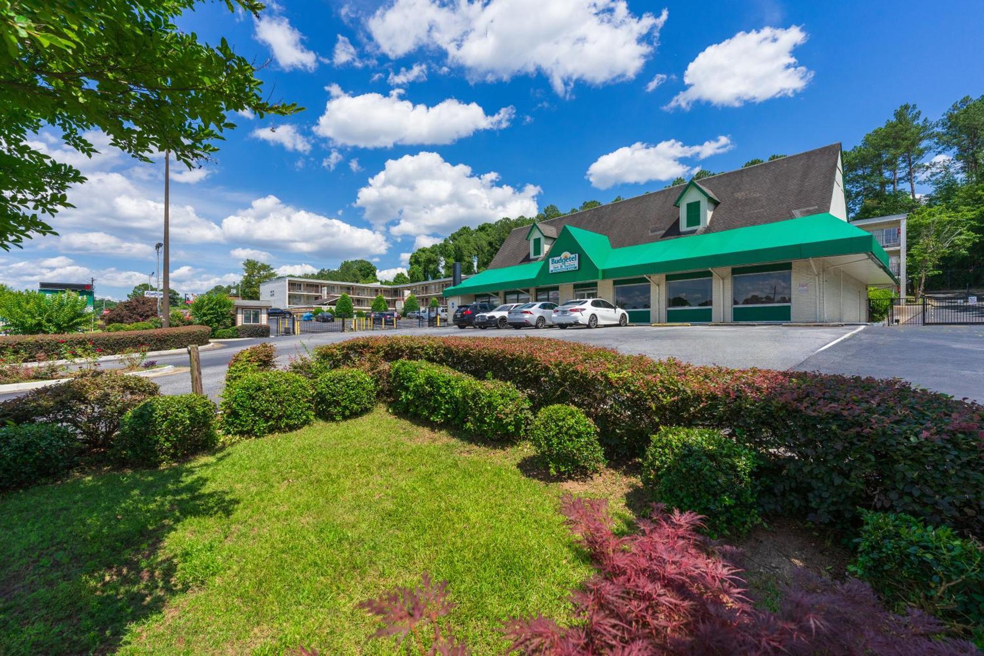 Budgetel Inn And Suites Lodge West Экстерьер фото